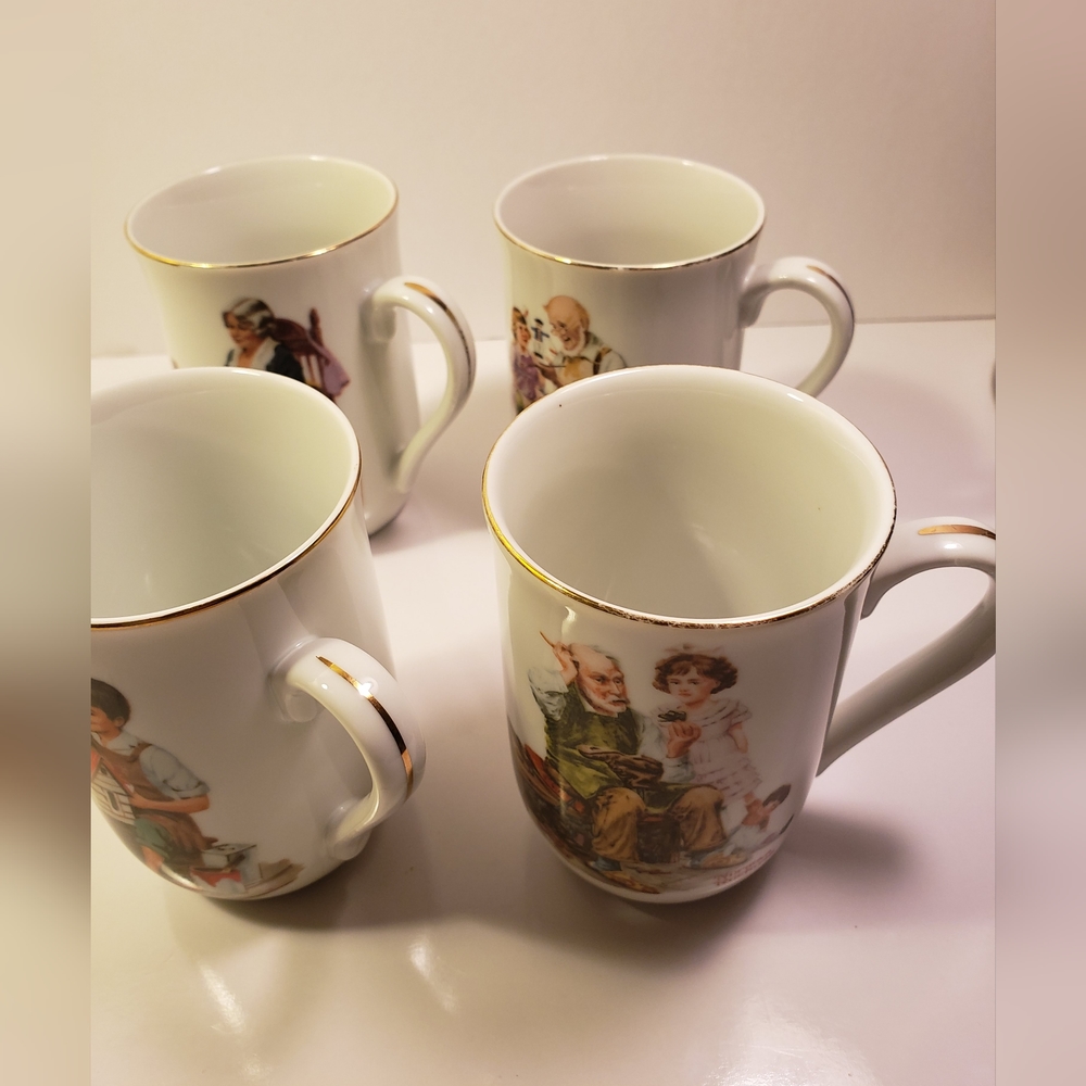 Norman Rockwell Set of 4 Mugs, Very good condition with gold trim - Pre-owned